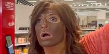 Woman entered store with her face smeared in dark makeup, then told her excise to the employee who confronted her!