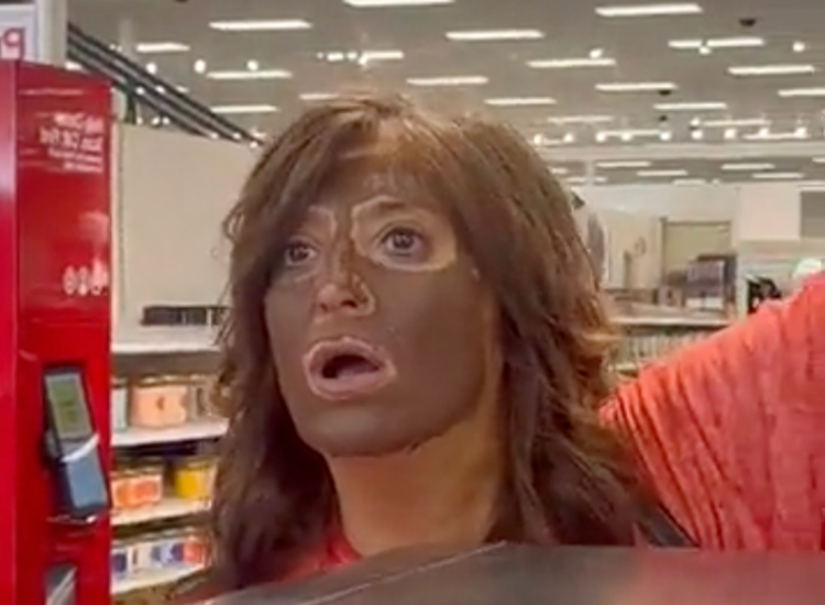 Woman entered store with her face smeared in dark makeup, then told her excise to the employee who confronted her!