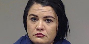 Woman tricked younger woman into living with her and her family, only to take her captive and starve the woman, lock her in a cage and severely burn her arms, chst and back by pouring a pot of boiling water on her; sentenced