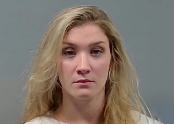 Mom of 1-year-old girl, who was hospitalized with a grim prognosis for meaningful recovery after she was beaten so severly the child suffered bleding skuII fracture and has been in a persistent vegetative state fort the last 4 months, was taken into custody!