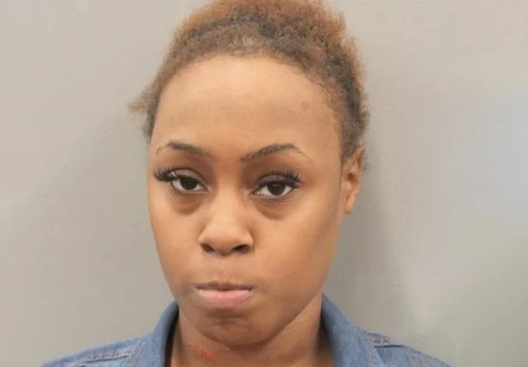 Woman claims her partner grabbed her by her coat, which is why she shot him several times, killing him, after confronting the man about the mesages he exchanged with another female; charged