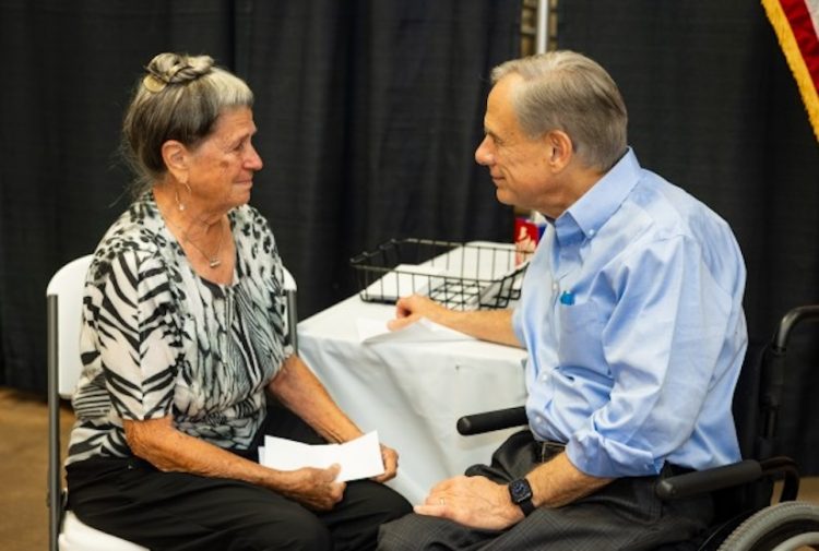 Governor Abbott presented flood relief checks to Concho Valley families