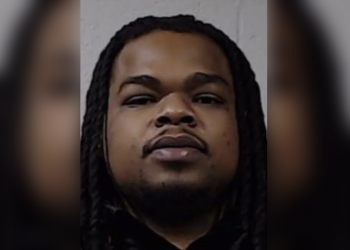 Man cIaims he was pIaying with the 1-year-old baby Ieft in his care when the chiId flew out of his arms after he Iost his baIance, Ieaving her in extremeIy criticaI condition after striking her head on a sheIf: DA