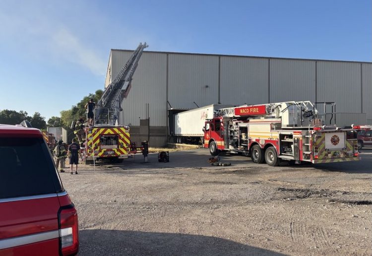 Commercial building fire in Waco escalates to second alarm as firefighters continue battling heavy flames