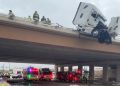 Waco firefighters rescue 18-wheeler driver after truck hangs over I-35 bridge in Elm Mott