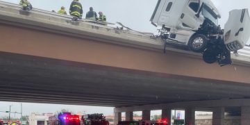Waco firefighters rescue 18-wheeler driver after truck hangs over I-35 bridge in Elm Mott